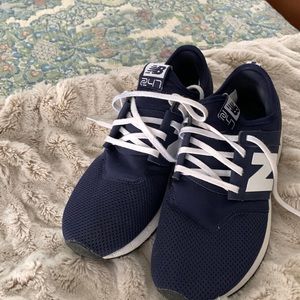 New Balance Navy Sneakers size 9. Excellent condition.